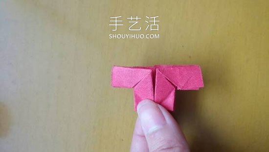 婴儿小衣裤折叠方法教程 -  www.shouyihuo.com