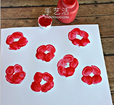 儿童指纹罂粟花朵的画法手工教程 -  www.shouyihuo.com